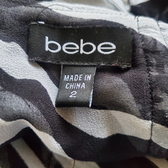 Bebe High Waisted Zebra Print Ruched Ruffle Mini Skirt Size 2 - Picture 3 of 4